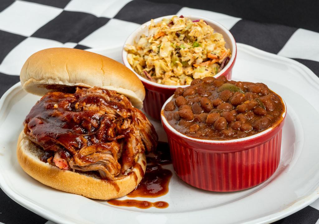 184. The Beast V12  · Feeds 12! 3.5 lbs. of Victory Lane BBQ’s Slow Smoked Pulled Pork, Seasoned with our Award-Winning Competition Rub!  Served with 12 Buns, a Pint of our Award-Winning BBQ Sauce, Quart of Cole Slaw and your choice of 3 Additional Quarts of our Signature Sides.