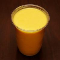 Mango Lassi · Traditional cold and refreshing yogurt based drink made with mango pulp. Gluten free.