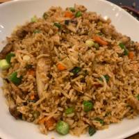 Chicken Fried Rice · Basmati rice stir-fried and seasoned to perfection with shredded piece of tender chicken. Gl...