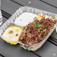 21. Lamb Gyro Plate · Lettuce, tomato, pickles, onion, lamb, rice, salad, tzatziki, mix spicy garlic sauce.