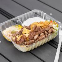 24. Tri- Meat Plate · 3 types of meat. Chicken, lamb, beef, rice, mix Salad, tzatziki, hummus mix spicy garlic sau...