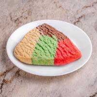 Tri-Color Polvoron  · Triangle shape cookie made up of three colors usually chocolate, strawberry and vanillia. 