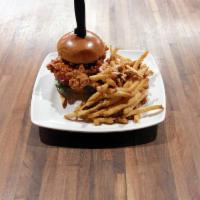  Fried Chicken Sandwich · 6 oz. fried chicken breast  topped with lettuce, sliced tomato and onion.Served with fries