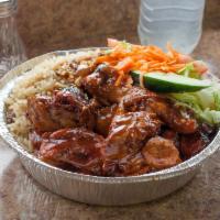 Brown Chicken Stew · Includes rice and your choice of side. 