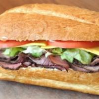 Russian Sandwich · Roast beef, Muenster cheese, caramelized onions, lettuce, plum tomatoes and Russian dressing...