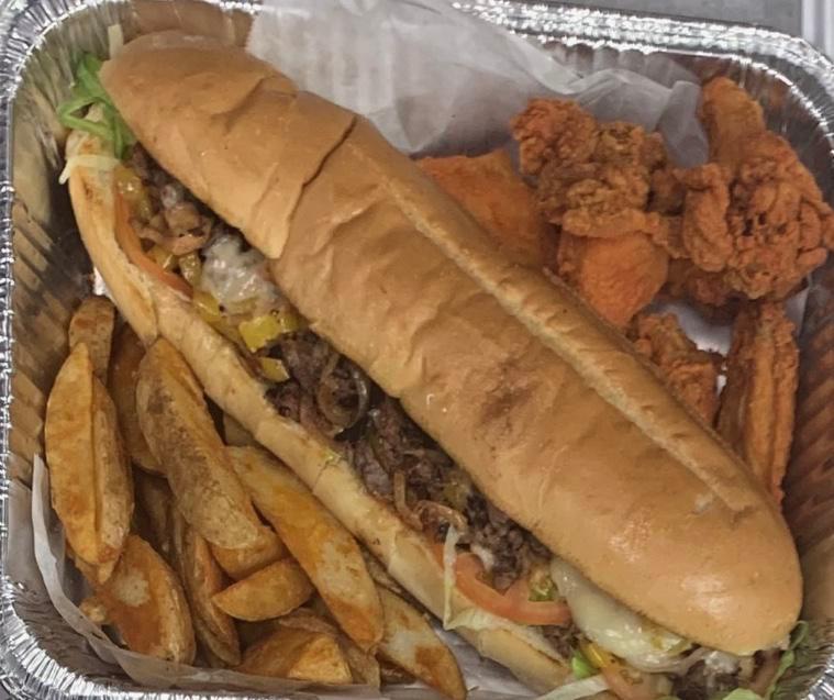 Large Steak Sub, 4 Wings & potatoe wedges Special · Large philly steak and cheese with up to 9 toppings, 4 wings with your choice of sauce and potatoes wedges or fries. 
Please choose the toppings you like in the sub