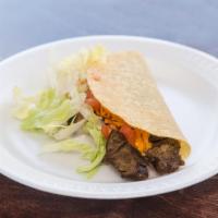 25. Steak Taco · Served with iceberg lettuce, tomato and topped with cheddar cheese.