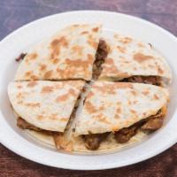 32. Jack Cheese and Chicken Quesadilla Sincronizada · Made with 2 fresh flour tortillas stuck together with melted cheese.
