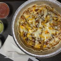 E3. Mexican Pizza · Light crispy tortilla piled high with your choice of any 2 ingredients, beef, chicken, bean,...