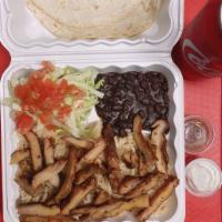 S1. Grilled Chicken Special · Served with 2 pieces fresh tortillas Mexican rice, beans, sour cream, salsa ranchera, lettuc...
