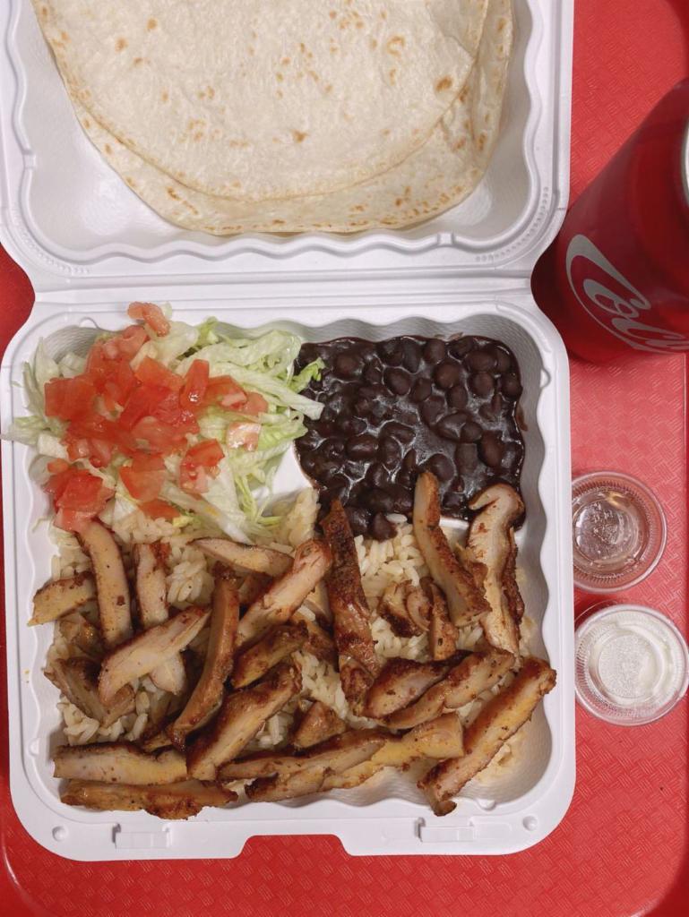 S1. Grilled Chicken Special · Served with 2 pieces fresh tortillas Mexican rice, beans, sour cream, salsa ranchera, lettuce and tomatoes. Includes a free soda.