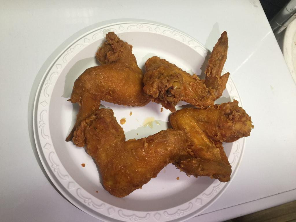 A1. Fried Chicken Wings · 4 pieces.