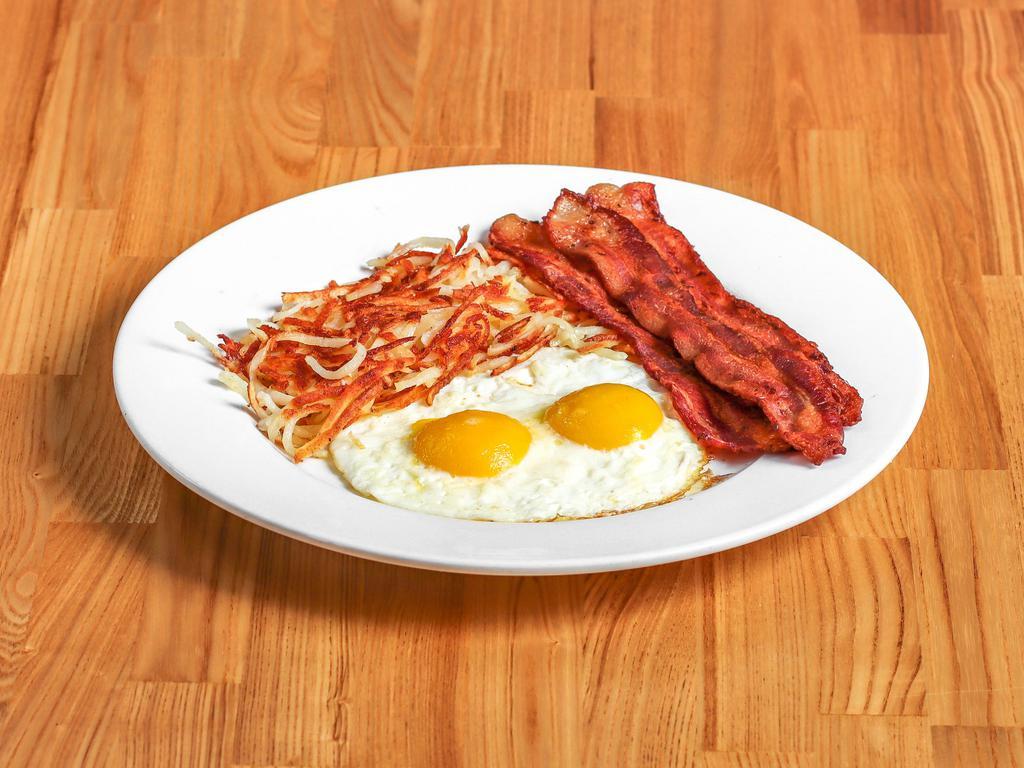 The Classic Breakfast · Eggs and your choice of grilled ham, bacon, sausage patties, turkey bacon, or chicken apple sausage. Served with your choice of hash browns or grits, and toast or pancakes.