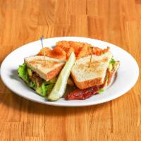 Homemade BLT · Smoked bacon, romaine lettuce, oven roasted tomatoes, and avocado on toasted bread with mayo...
