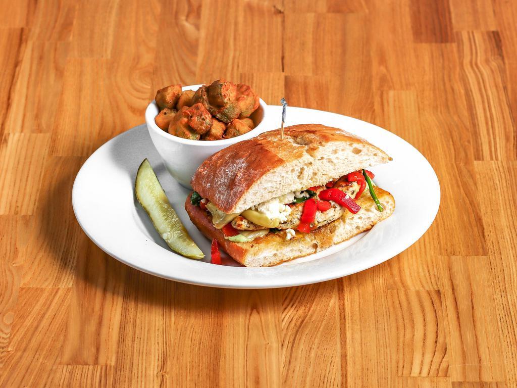 Italian Panini · Grilled chicken breast, artichoke heart, roasted red pepper, feta cheese, spinach, tomato, and pesto mayo on toasted focaccia bread.