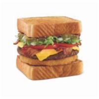 Bacon Cheeseburger TOASTER® · 100% Pure Beef | BBQ Sauce | Bacon | Onion Ring | Chopped Onion | Lettuce | Tomato | Pickles