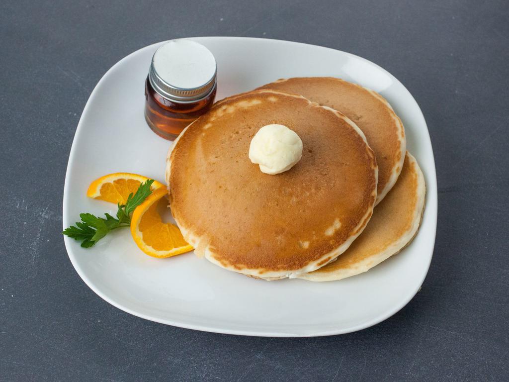 Pancakes · Served with butter and syrup.