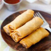Veggie Spring Roll · Crispy rice paper wrapped with mixed vegetable.