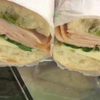 Smoked Turkey Sandwich · Smoked turkey breast, melted brie, sun-dried tomatoes, honey mustard. Includes your choice o...