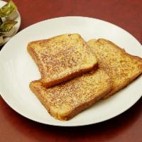 French Toast · Served with butter and syrup. 