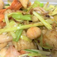 Q8. House Special Stir Fry 特色小炒皇 · Stir Fried Mix sea food （Prawn , Squid , Alaska Sea Cucumber，Sea Claim）and Veg. (Macadamia ,...