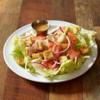 House Salad · Lettuce, tomato, onions and croutons.