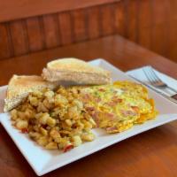 Western Omelette · ham, onion, peppers and cheddar cheese (comes w/ home fries and toast)