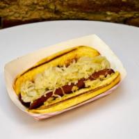 Beef Dog · Hebrew National Beef Dog served with Sabrett Kraut top-loaded on a New England hot dog bun.