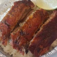 Pork Ribs · Pork ribs With rice and beans