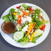 Greek Salad · Feta cheese, romaine, lettuce, tomato, onion, green pepper, red pepper, cucumber and carrot.