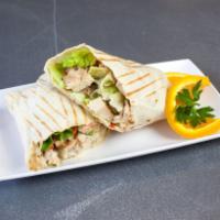 California Wrap · Grilled chicken breast, lettuce, tomatoes, avocado, roasted pepper with ranch or blue cheese...