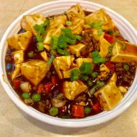123. Ma Po Tofu · Served with meat. Hot and spicy.