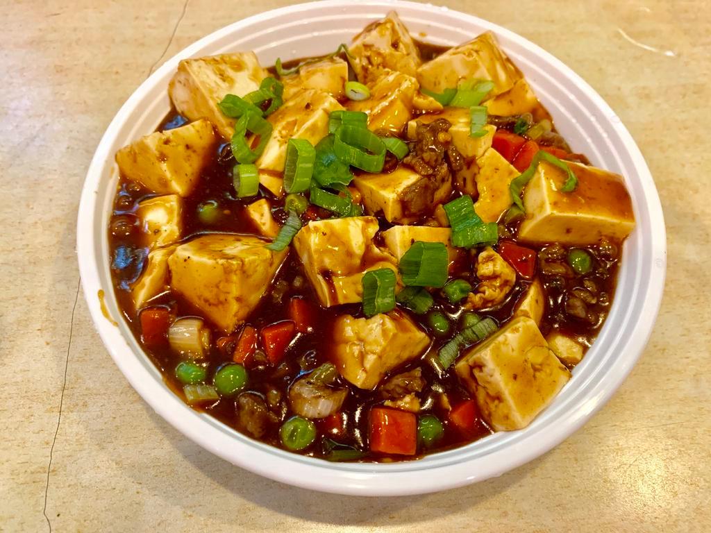 123. Ma Po Tofu · Served with meat. Hot and spicy.