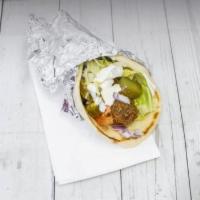 Falafel Sandwich · Falafel and some salad on a pita bread with your choice of sauce.