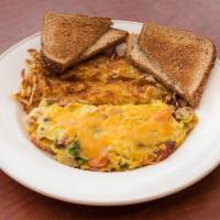 Denver Omelette Breakfast · Green bell peppers, onions and ham with melted cheese folded in 3 eggs.
