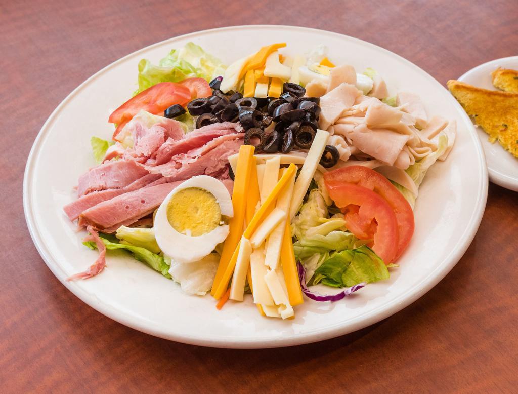 Chef Salad · Fresh greens topped with ham, turkey, 2 cheeses, tomatoes, olives and boiled eggs. Served with your choice of dressing.