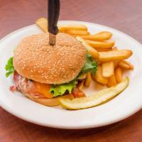 1/2 lb. Bill's Burger · The ultimate burger stacked with ham, bacon, fried egg and cheese. Topped with lettuce, toma...