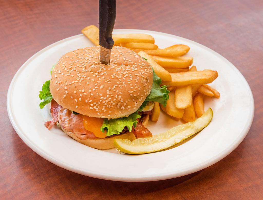 1/2 lb. Bill's Burger · The ultimate burger stacked with ham, bacon, fried egg and cheese. Topped with lettuce, tomato, onion, mayo and dill pickle spear. Includes your choice of side.