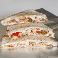 Chicken Quesadilla · Topping choices: onion, green peppers, mushrooms, mozzarella cheese and sour cream.