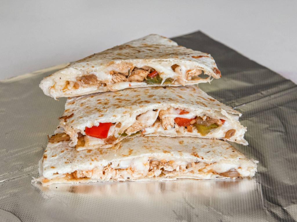 Chicken Quesadilla · Topping choices: onion, green peppers, mushrooms, mozzarella cheese and sour cream.