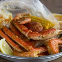 Duo Delight · 1 crab. 1/2 lb. of snow crab, 1/2 lb. of ez peel shrimp with 3 potatoes and 1 corn on the co...