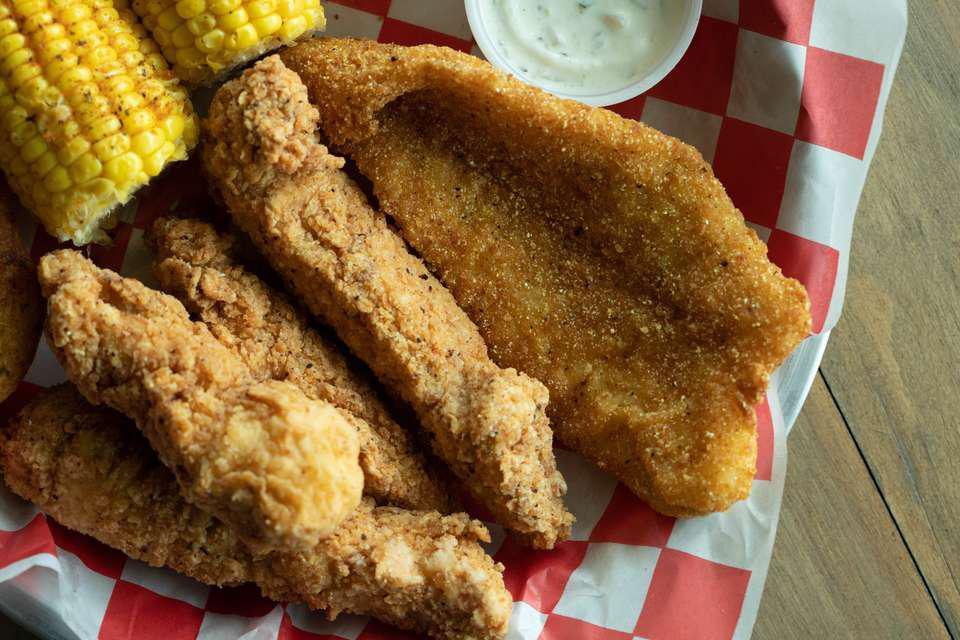 4 Tenders and 1 Fish · 4 chicken tenders served combined with your choice of a fried piece of tilapia or catfish.