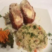 Cordon Bleu · Chicken wrapped around cheese and ham, then breaded and pan fried.