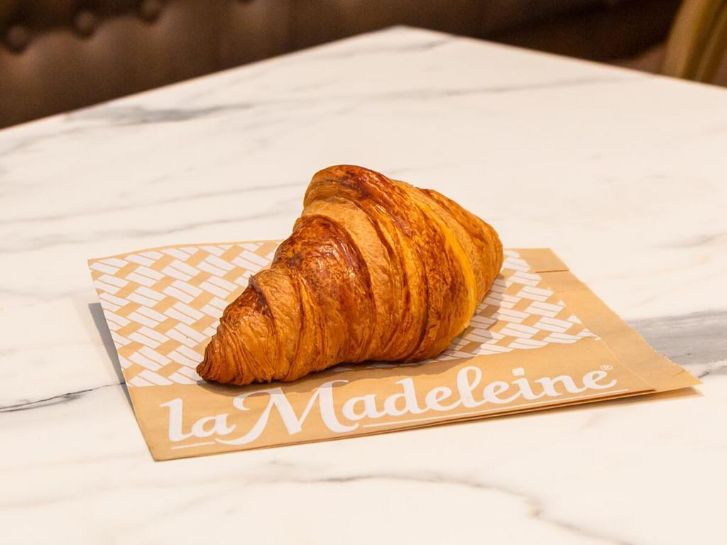Butter Croissant · Flaky dough layered with rich creamy butter, baked fresh throughout the day!
