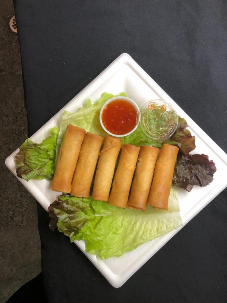 4. Deep Fried Egg Roll · House made with chicken, carrots, cabbage, onions wrapped in rice paper then fried until golden brown.  Served with a side of traditional sweet chili sauce