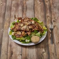 Caesar Salad with Chicken · Crispy romaine lettuce, croutons and Parmesan cheese.