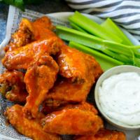8.Pcs Buffalo Wings · Served with celery sticks and bleu cheese dressing.