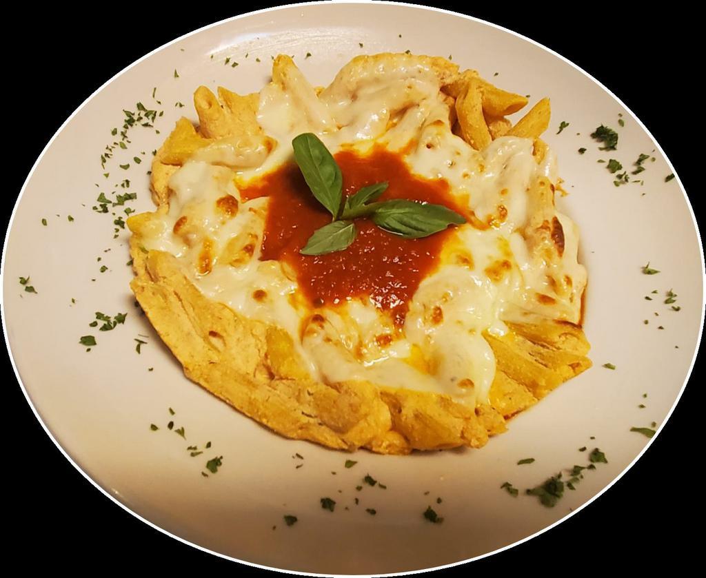 Baked Ziti · Penne pasta with tomato sauce, ricotta cheese and mozzarella cheese.