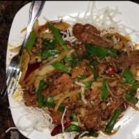 Mongolian Beef · Thinly sliced beef sauteed with red hot chili peppers and white and green onions.chef recomm...