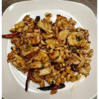 Kung Pao Chicken Chinese Style · White chicken breast meat sauteed with green onions and topped with peanuts